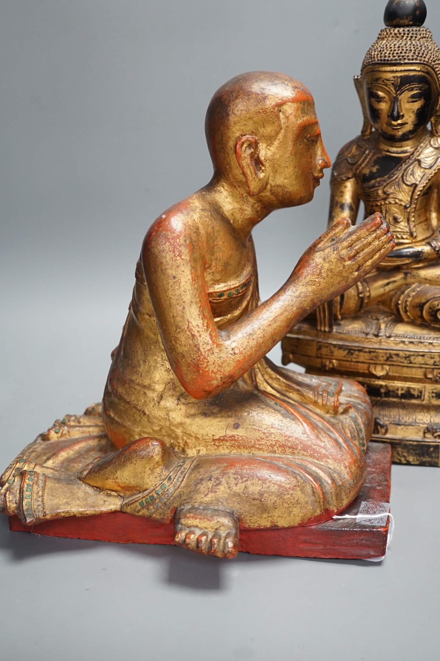 Two Thai gilt wood figures of Buddha, tallest 41cms high